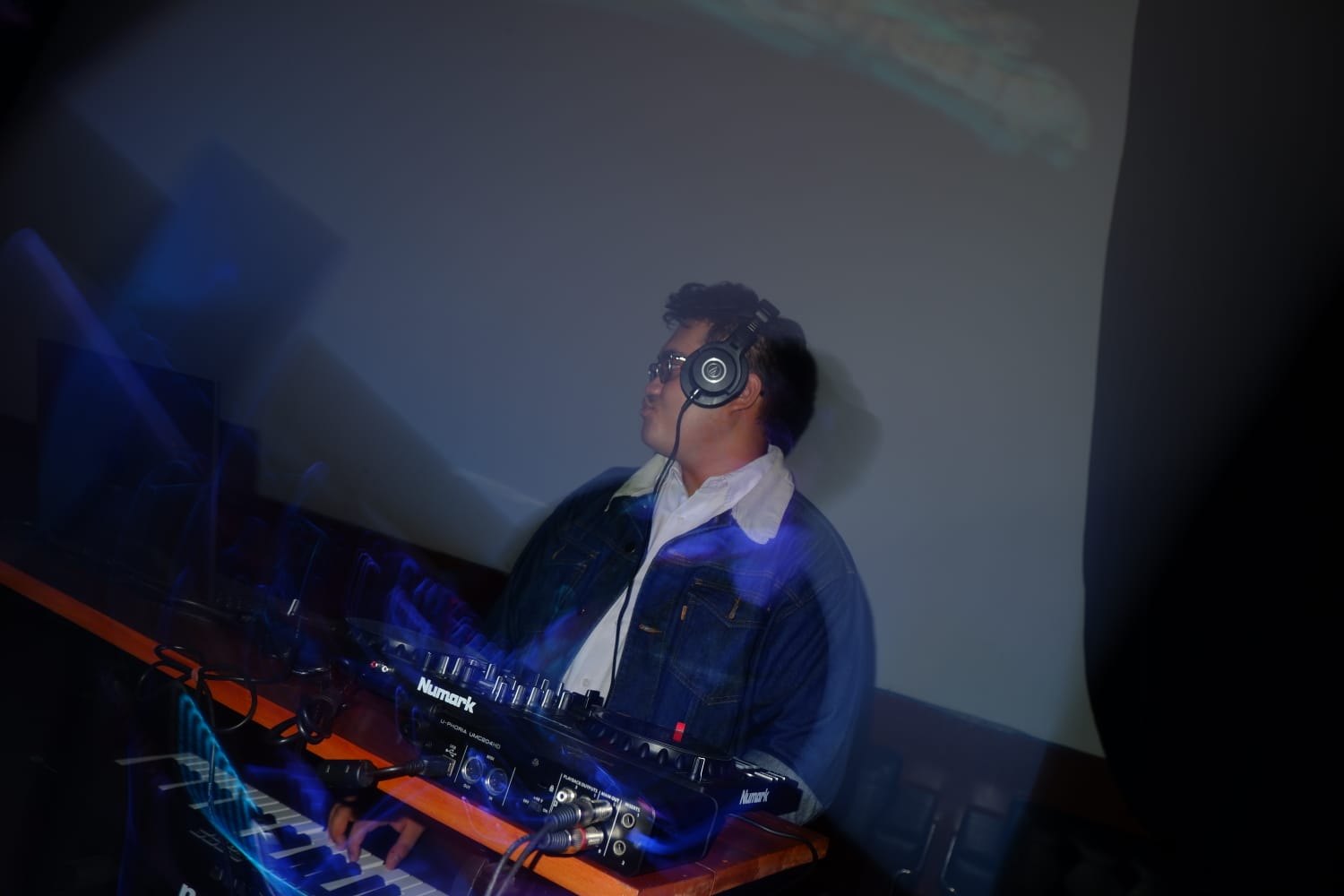 Maxwell performing with DJ controller and keyboard